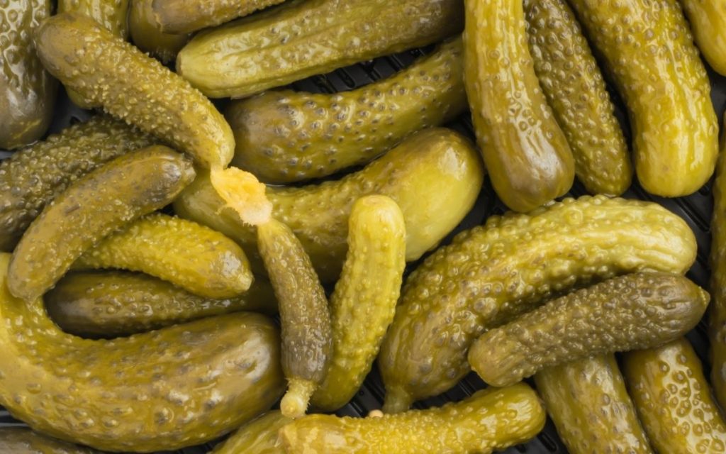 A pile of gherkins sit.